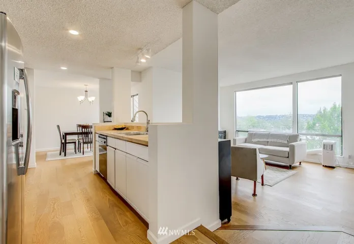 Welcome home to this fully remodeled top-floor condo! Upgrades abound with new appliances, new flooring, new paint, new faucets, new fixtures + so much more!