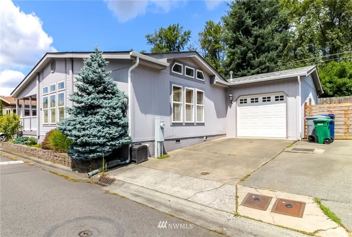 Front of home with oversized one car garage