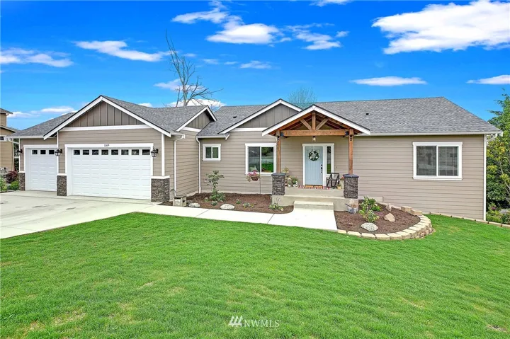 Sprawling Rambler Design, with Finished Basement and Views over Port Susan and Cascades.