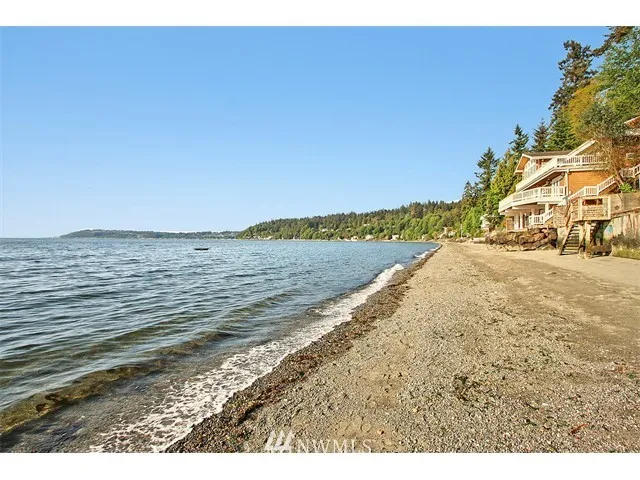 Gravelly beach below the lot.
