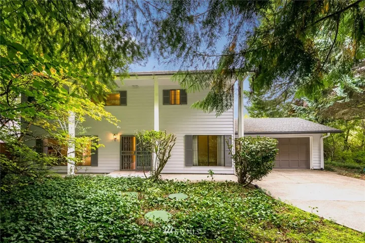 Welcome to 5525 Henslin Dr SE - this classic beauty is full of character and wonderfully private with all this lush landscaping, but just out back is lakefront access to Pattison Lake.  You don't want to miss this!