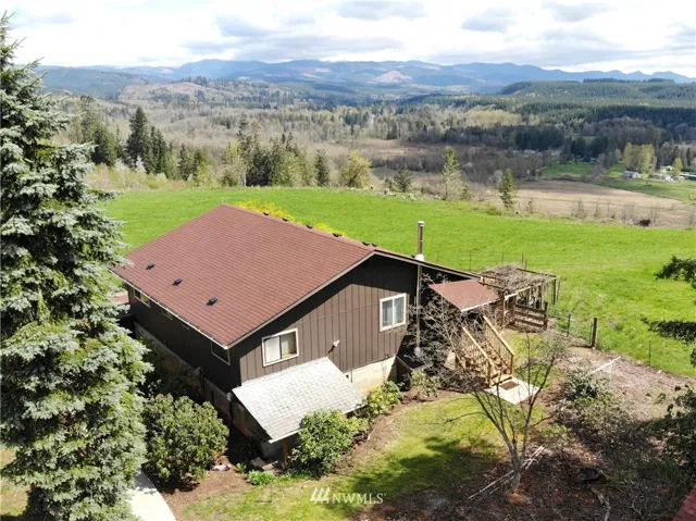 Welcome to this 3 bedroom, 2.5 bath home sitting on over 20 gorgeous acres.