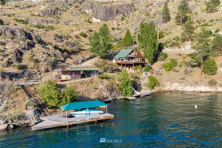 Your private cove includes the main cabin, two docks, and guest house