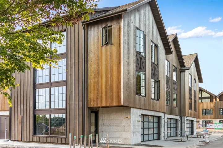 Roost Live Work Townhomes.  Exterior materials are long lasting with little to no maintenance... Concrete, Corten Steel that is meant to rust, Cedar Siding, Pella Windows.  The kind of quality construction that we can be proud of!