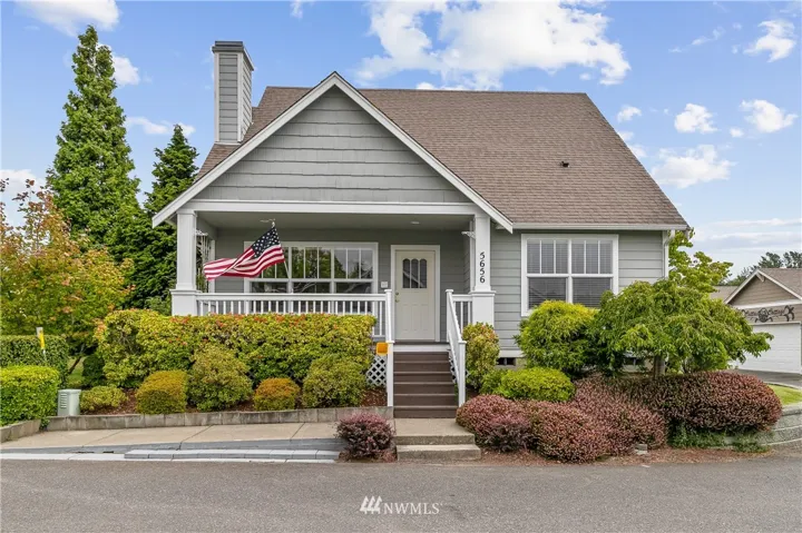 Corner Lot, front entrance, garage around corner to Right.