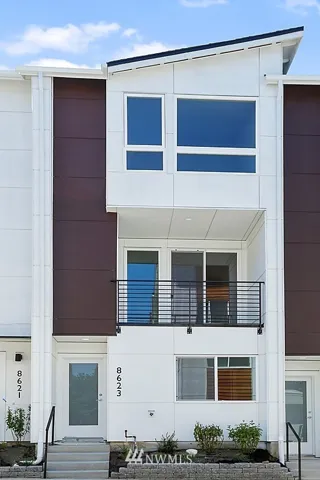 Photo is of completed home of similar floorplan