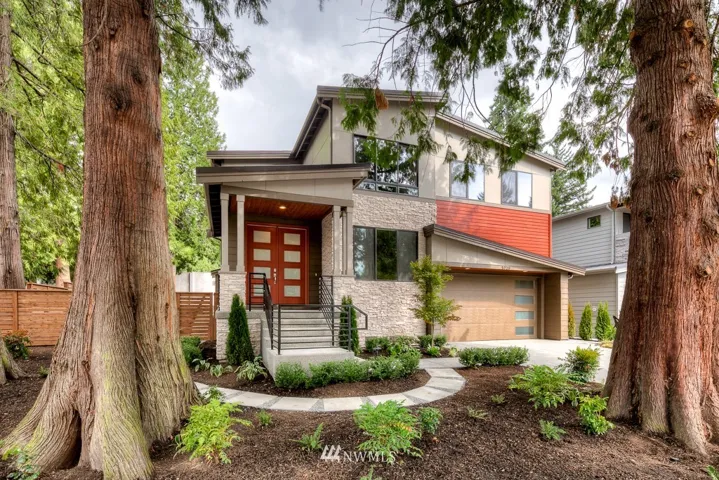 Warm, contemporary home situated on private & sizeable homesite in sought after area at a great value!  Metal roof, in ground sprinkler system, covered patio, AC and so much more!