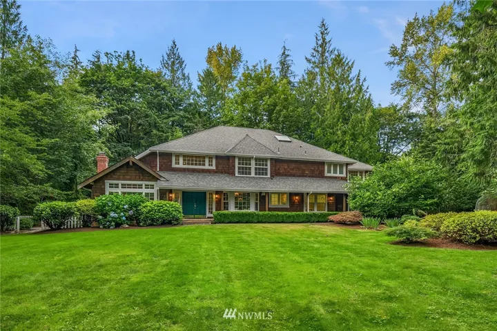 Welcome to this lovely shingle exterior custom home tucked away on 2.15 acres. Originally built in 1995, the home also features a three car garage, garden shed, and sport court.