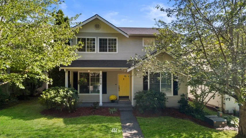 Front view of home.  Nice sitting porch.