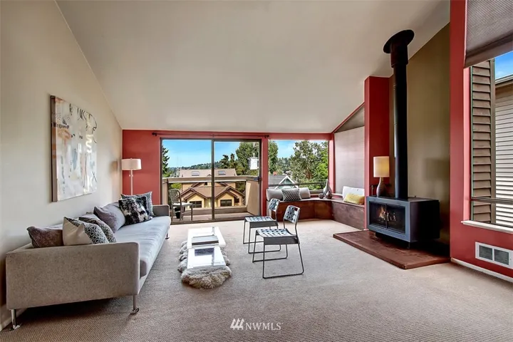 Large sun-drenched living room with vaulted ceilings.