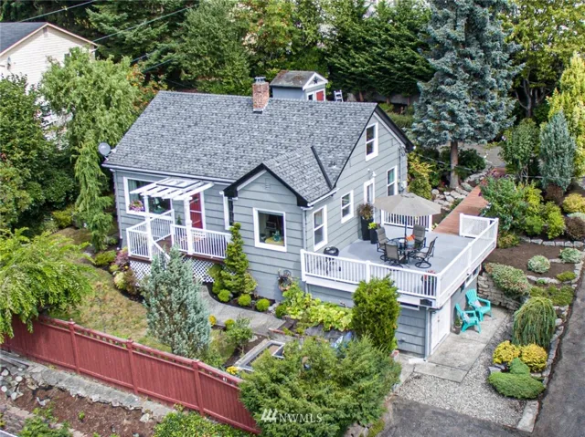 Beautiful home with mature landscaping and several areas to enjoy!