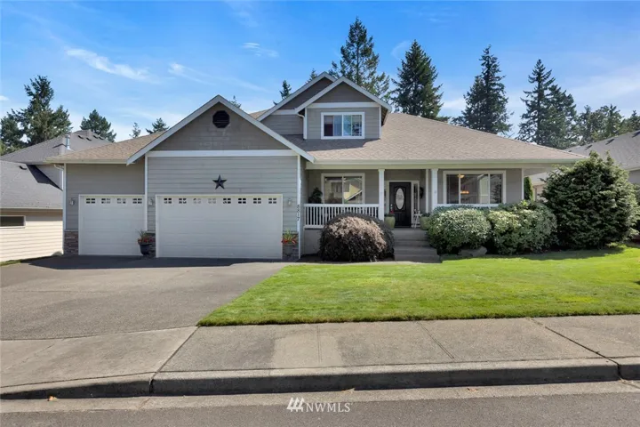 This is a beautiful 5 bedroom home with main floor master in an exclusive enclave of magnificent homes with private access to Lake Steilacoom!