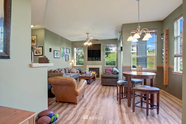 Enter to an open concept with high ceilings and flooded with light.
