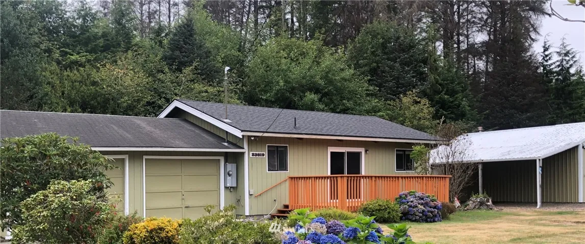 Home on 3 Parcels with covered parking for 6 cars!