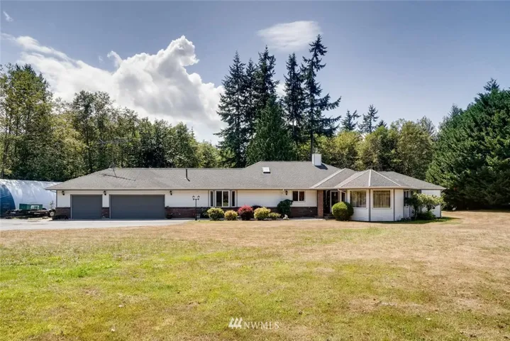 Set back off the road, this expansive home has lots of curb appeal!