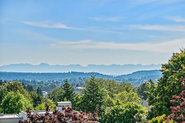 Perched high on the hill for unobstructed views of the Cascade Mountains over DT Redmond