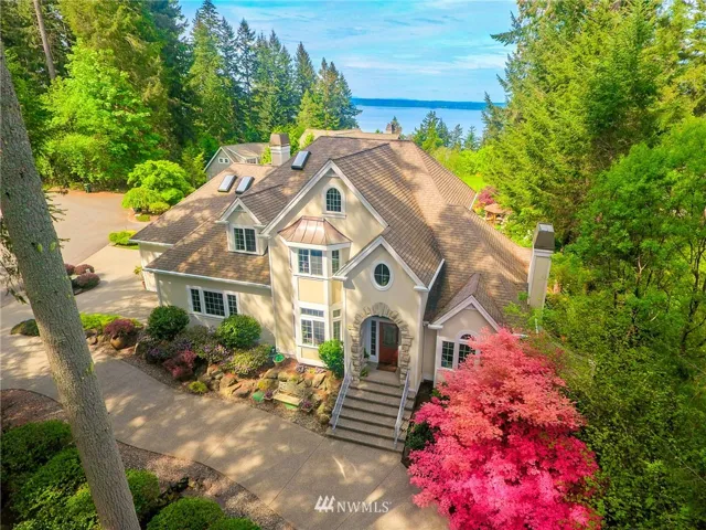 Front entry picture taken in spring with this beautiful maple in full color!
