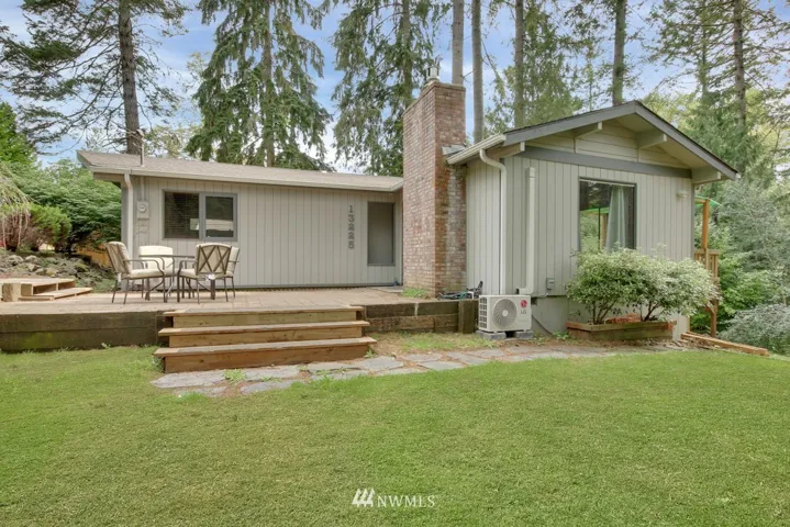 This charming home sits on a large lot that has play space and privacy!