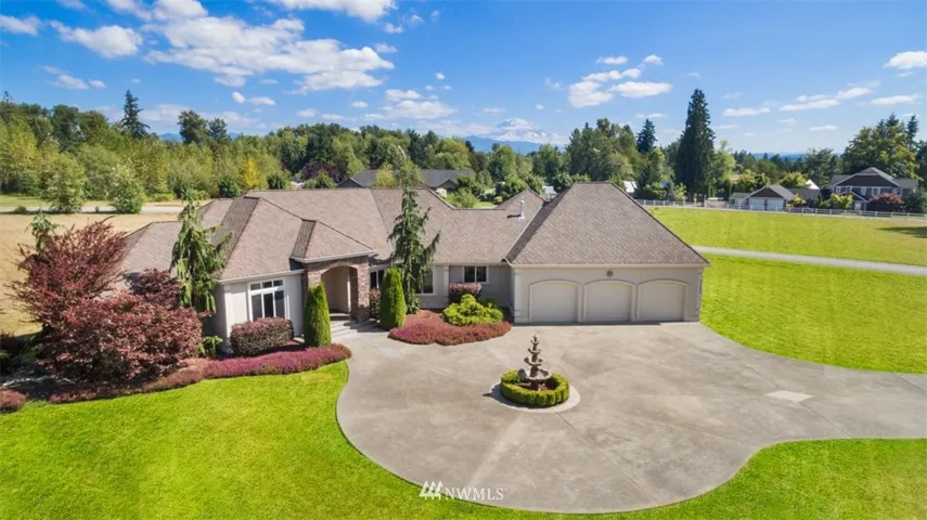 Custom rambler on 2.74 acres with stunning Mt Rainier view!
