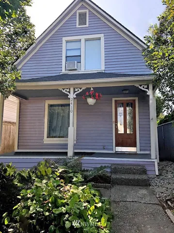 Craftsman charm greets you as you walk through the beautiful native growth landscaping onto a large covered front porch.