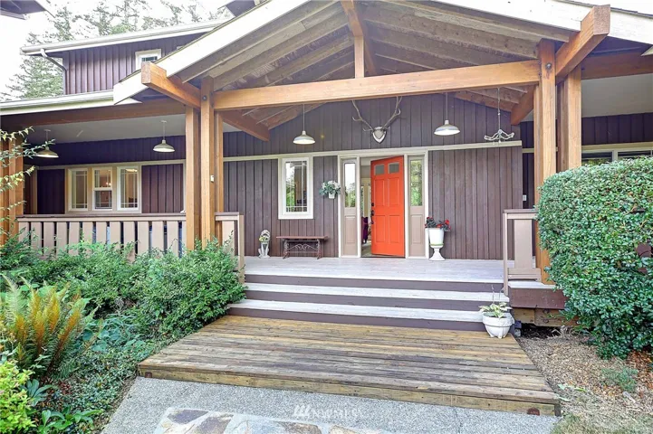 Grand covered entry porch to a magnificent Modern Farm home...