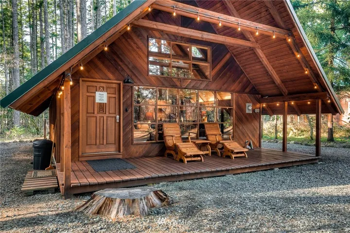Lovely covered porch in the front of the home to enjoy the outdoors year round.