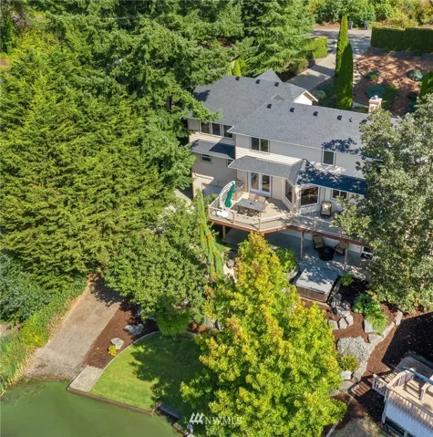 Life on the lake has never been so sweet.  Beautiful Long Lake home with a private permitted boat ramp and dock.There is also a boat lift for enjoying life on the lake.