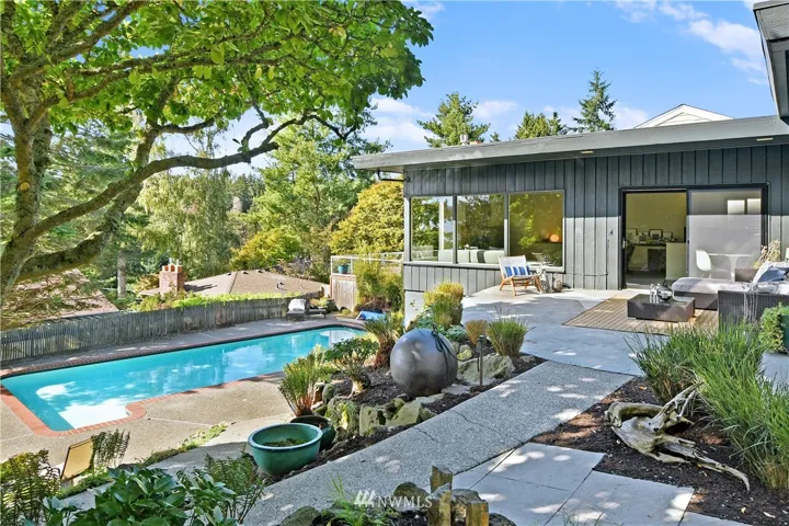One part Palm Springs MCM. One part Big Sur hillside hideaway.