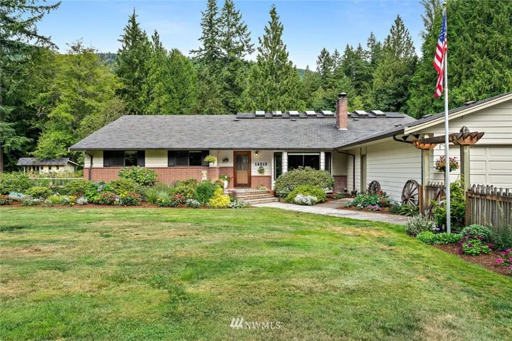 Welcome home to 14513 Jordan Rd., a fabulous 3 bedroom, 2.25 bath home on a 7.25 acre lot with DNR property behind the property.