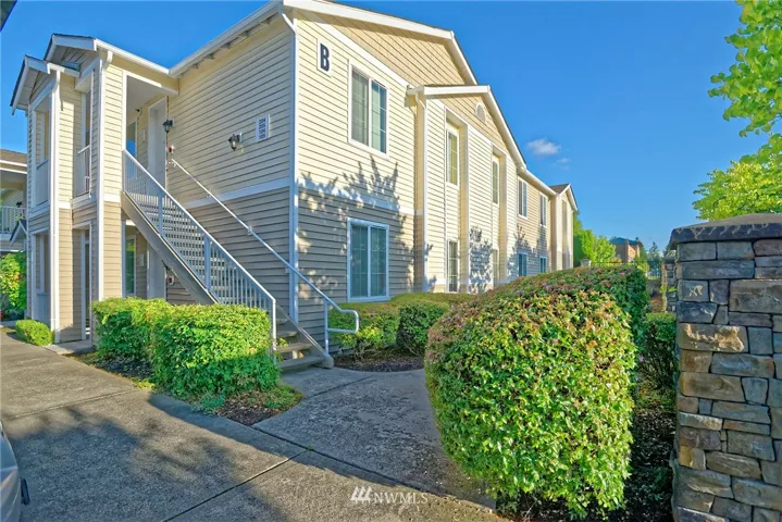 2 Bdrm 2 Bth Condo 2nd floor top floor corner unit in gated community. Open concept living great for socializing.Fully applianced kitchen w brand new microwave glass tile back splash,lots of cabinets w/pantry & nook w a balcony off it.Lrg living w electric FP open to den/dining room w extra shelves.Guest room & full size large bathroom. Your Master Suite/Bth offers a walk in closet,balcony,double sinks w shower. Carport,clubhouse w/amenities,close to shopping. Brand new carpet throughout & freshly painted. W/D included