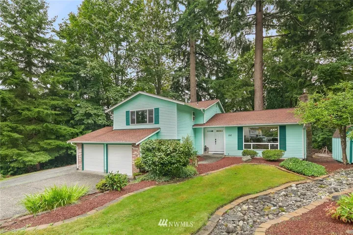 Front Exterior   .335 Corner Lot  Many many updates!  Kitchen, bathrooms, roof, gutters, doors, windows, furnace etc...
