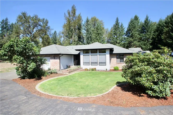 New paint, circular driveway and an over sized two car garage.