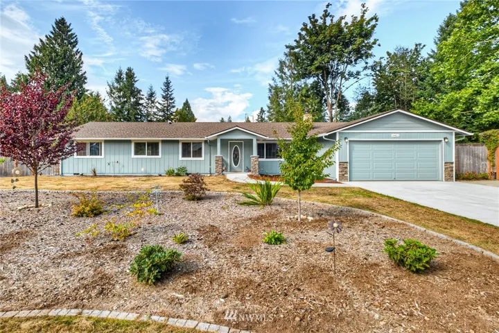 Beautiful updates to this great home!  Fresh paint and concrete drive and walkway.
