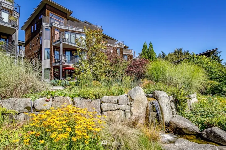 Exquisite one level, 2 bedroom at the award-winning Vineyard Lane Condominiums on Bainbridge Island!  Community courtyard with beautiful water feature.