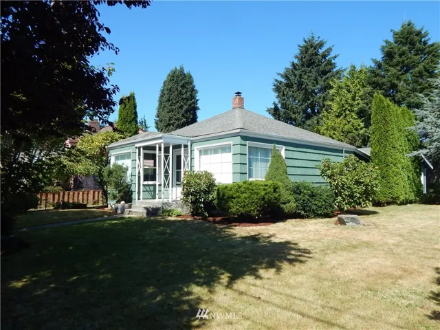 Beautifully landscaped on large corner lot location!