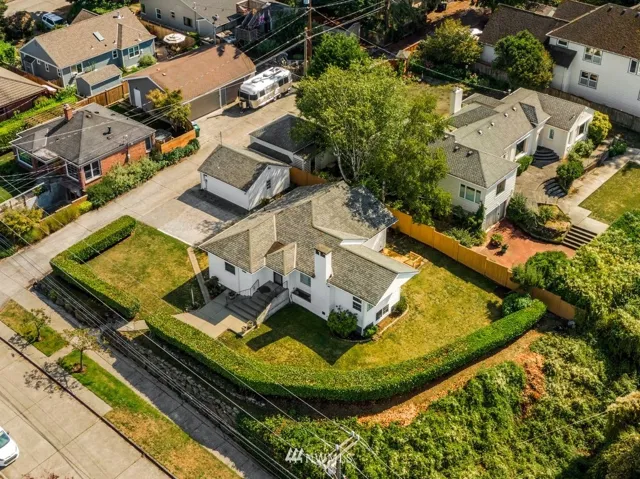 Large corner lot with a westerly view & alley access!