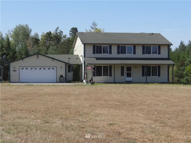 Five acres with 5 bedrooms, two car garage.