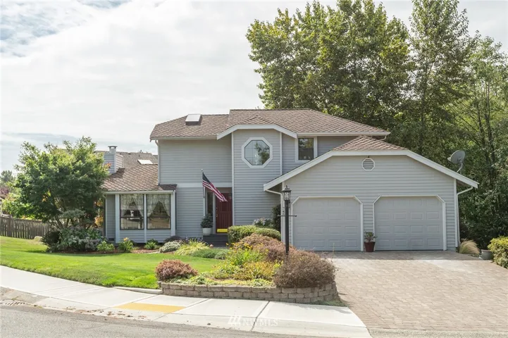 This lovely 3 Bedroom 2.5 Bath Home is on a Large Lot in the much sought-after West Campus neighborhood. You'll love the large Rear Deck, 2-Car Garage & Shop