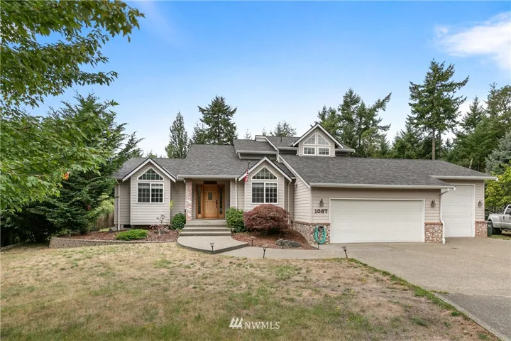 Welcome home to this beauty!  2 Car garage and an extra 10' bay for your favorite RV or yard equipment!