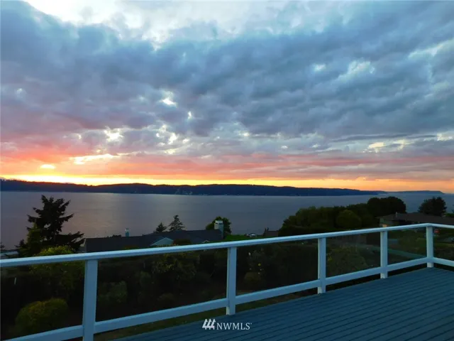 Sweeping protected views of the Sound, Whidbey Island, Olympic Mountains, Clinton Ferry, and spectacular sunsets.  An active ever changing scene that will never get old.
