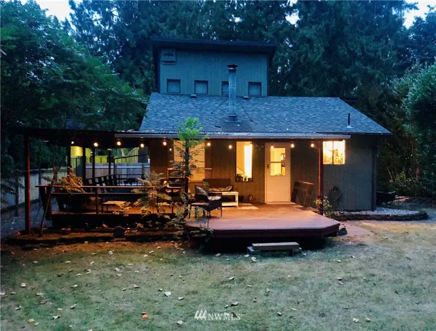 Back of home at dusk.