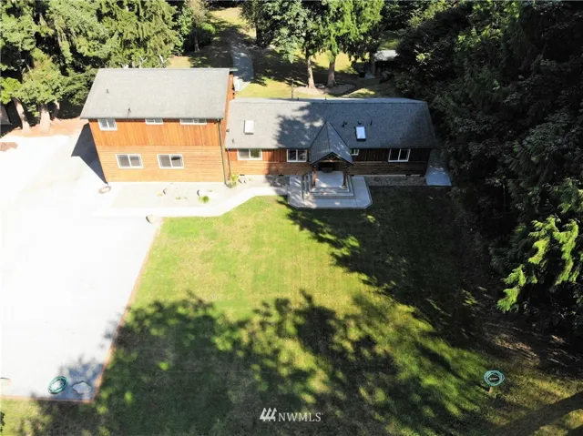 Wonderful 2,300 sq. ft. home on 1 1/4 acres that backs to hundreds of wilderness acres