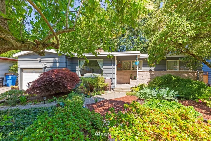 New 20 year warranty roof in 2014 + added additional roof vents. Exterior painted 2013 with Eco-Friendly Company.  Beautifully landscaped w/ private & serene back yard. 2114 replaced cloth wiring, 2017 new furnace.....many updates to this home.  A move in ready home!