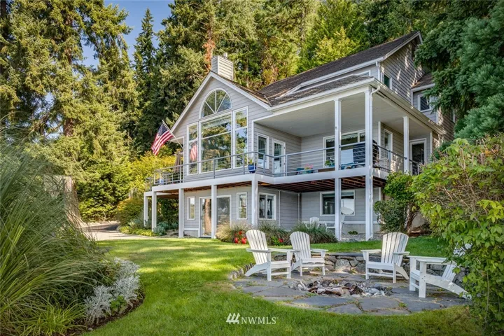 Welcome to 3180 Crystal Springs Drive NE, a west-facing waterfront home with views of gorgeous sunsets!