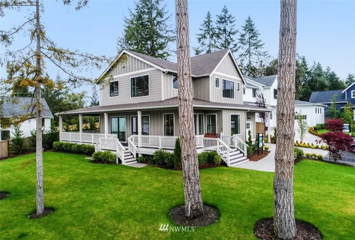 Located on a beautiful corner lot this home has large wrap around decks full of southerly light.