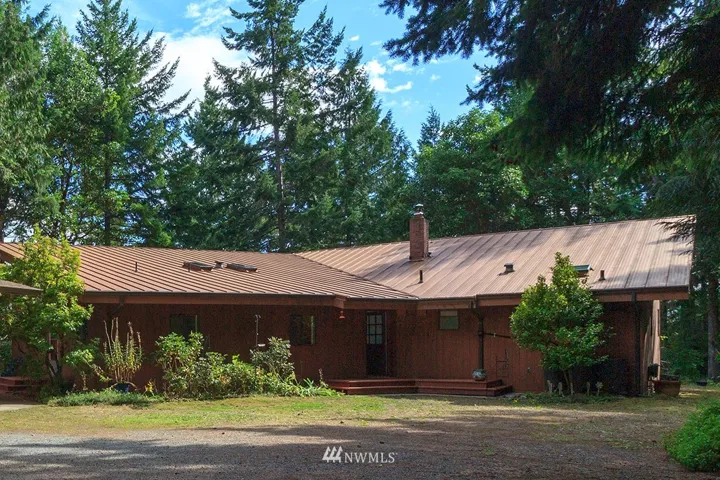 This home truly has it all. Privacy, views, acreage, outbuildings, and a fabulous floor plan. Toss in remodeled bathrooms, a large deck, newer roof, and many new windows ... what's not to love? Whether you're looking for a full-time home or a weekend getaway, you don't want to miss this wonderful home.