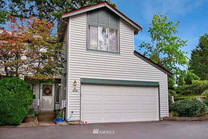 Great private corner lot unit with double car garage. More guest parking just steps away.