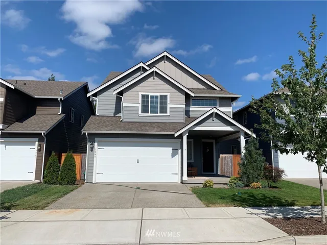 This home features a large covered front porch, 8' entry doors opens to 9' ceilings, rounded corners, white painted millwork. Slab granite kitchen countertops with backsplash. Gas fireplace with tile surround. 2" blinds. Fully fenced backyard. Versatile 3rd floor can be a playroom or 4th bedroom. Great location and neighborhood of just 37 homes. Close to shopping, freeways and easy commute to JBLM.