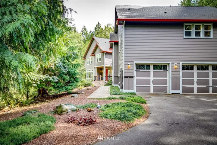 Beautiful home on 10 private acres with a 1300 sq ft Additional Living Quarter with separate entry, located above the 3 car garage.  The Sellers have made $24,000-30,000 annually by using the guest quarters as an airbnb/vacation rental.  Fantastic floor plan, great for multi-generational living, too.