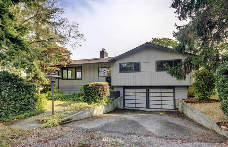 Spacious split-level home on a large lot with some great mid-century charm!